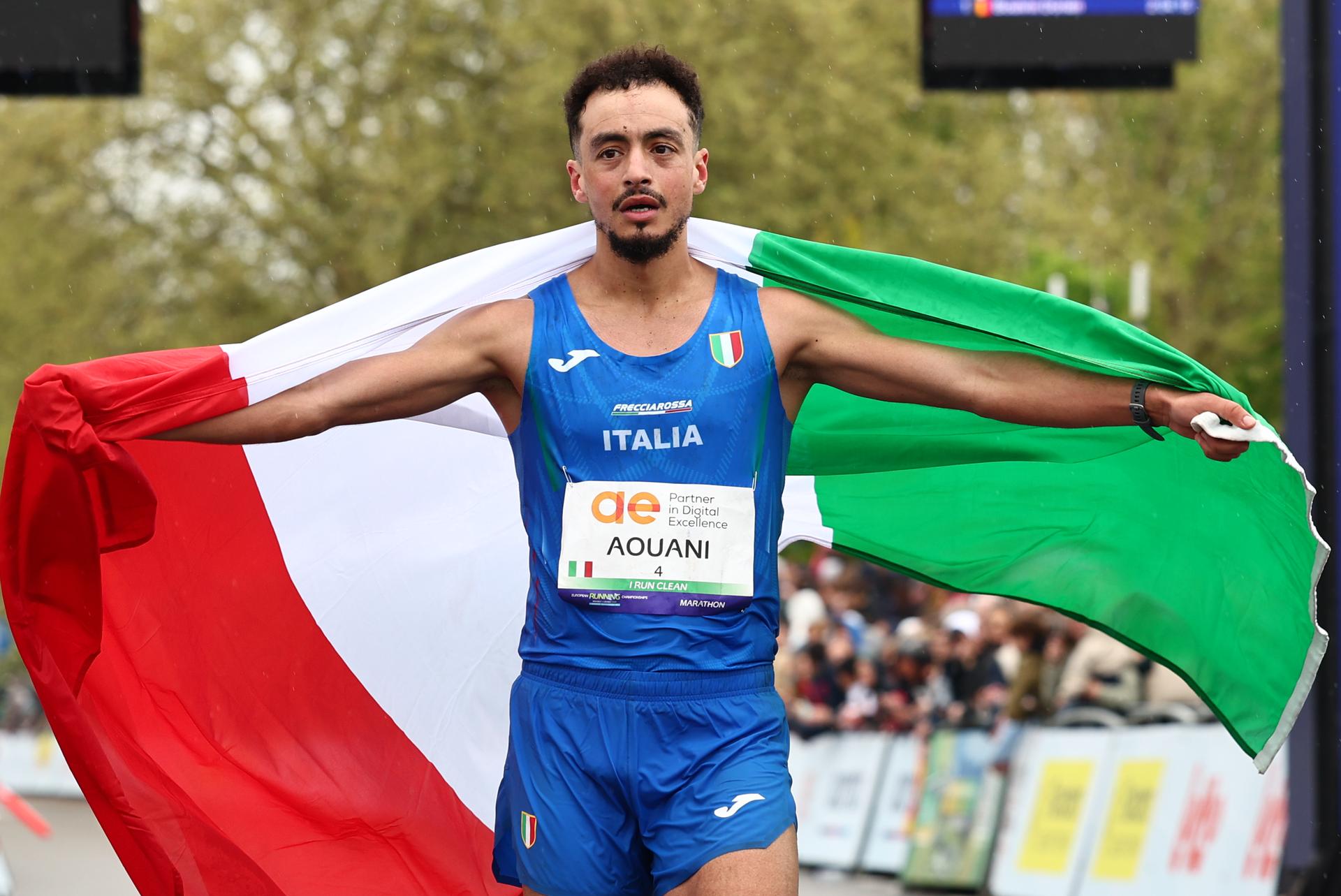Italian Aouani Iliass celebrates as he won the men marathon race at European Running Championships, from Leuven to Brussels, Sunday 13 April 2025. BELGA PHOTO DAVID PINTENS