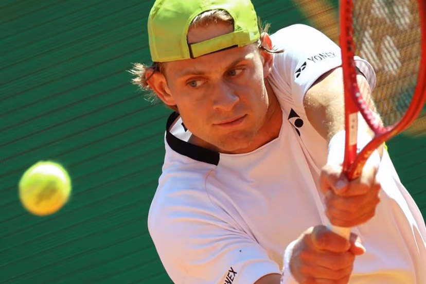 Belgium's Zizou Bergs returns to Germany's Alexander Zverev during their Monte Carlo ATP Masters Series Tournament round of 16 tennis match on Court Rainier III at the Monte-Carlo Country Club in Roquebrune-Cap-Martin, south-eastern France on April 9, 2026. Valery HACHE / AFP