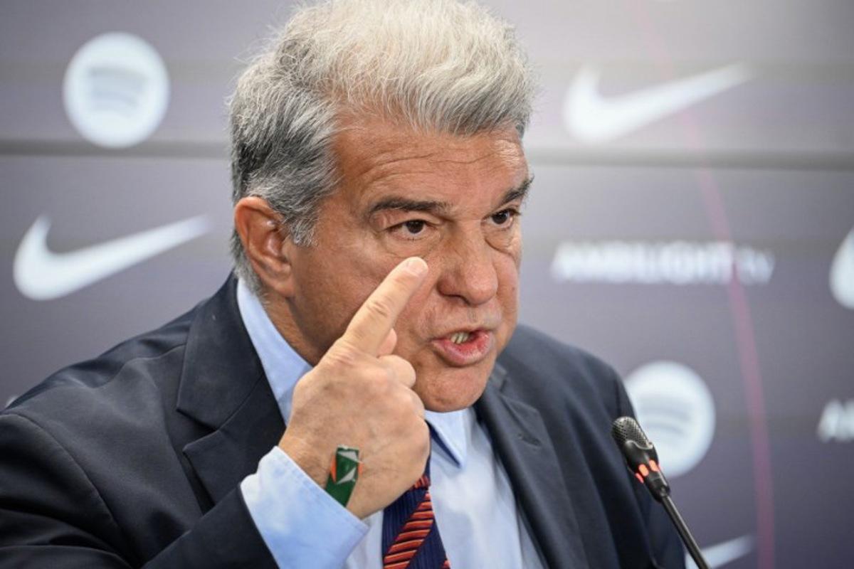 FC Barcelona's President Joan Laporta gestures during a press conference at the Ciudad Deportiva Joan Gamper in Sant Joan Despi, near Barcelona, on January 14, 2025. Dani Olmo's future at Barcelona remains in the balance as the Catalan club pursue their legal battle to get the midfielder registered to play once more. FC Barcelona's failure to meet La Liga's budgetary rules to license both Olmo and forward Pau Victor before the end of last year currently leaves them ineligible to play for the rest of the season. Josep LAGO / AFP