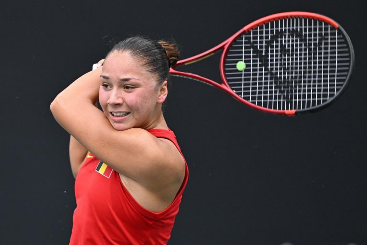 Belgium's Sofia Costoulas hits a return to China's Wang Xiyu during their women's singles match at the Billie Jean King Cup tennis play-offs at the Guangzhou Nansha International Tennis Center in Guangzhou, in south China's Guangdong province on November 17, 2024. STR / AFP