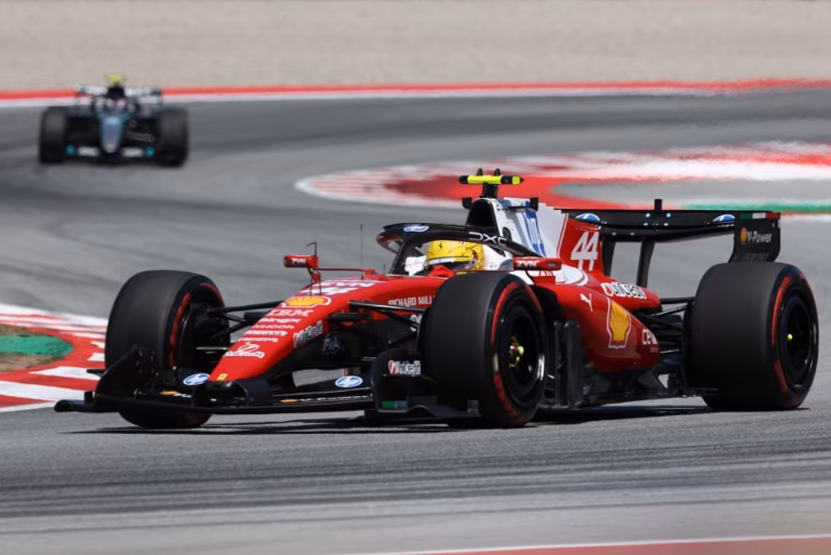 Ferrari's British driver Lewis Hamilton drives ahead of Mercedes' Italian driver Kimi Antonelli during the Catalonia Formula One Grand Prix at the Circuit de Catalunya in Montmelo, on the outskirts of Barcelona, on June 14, 2026. Josep LAGO / AFP