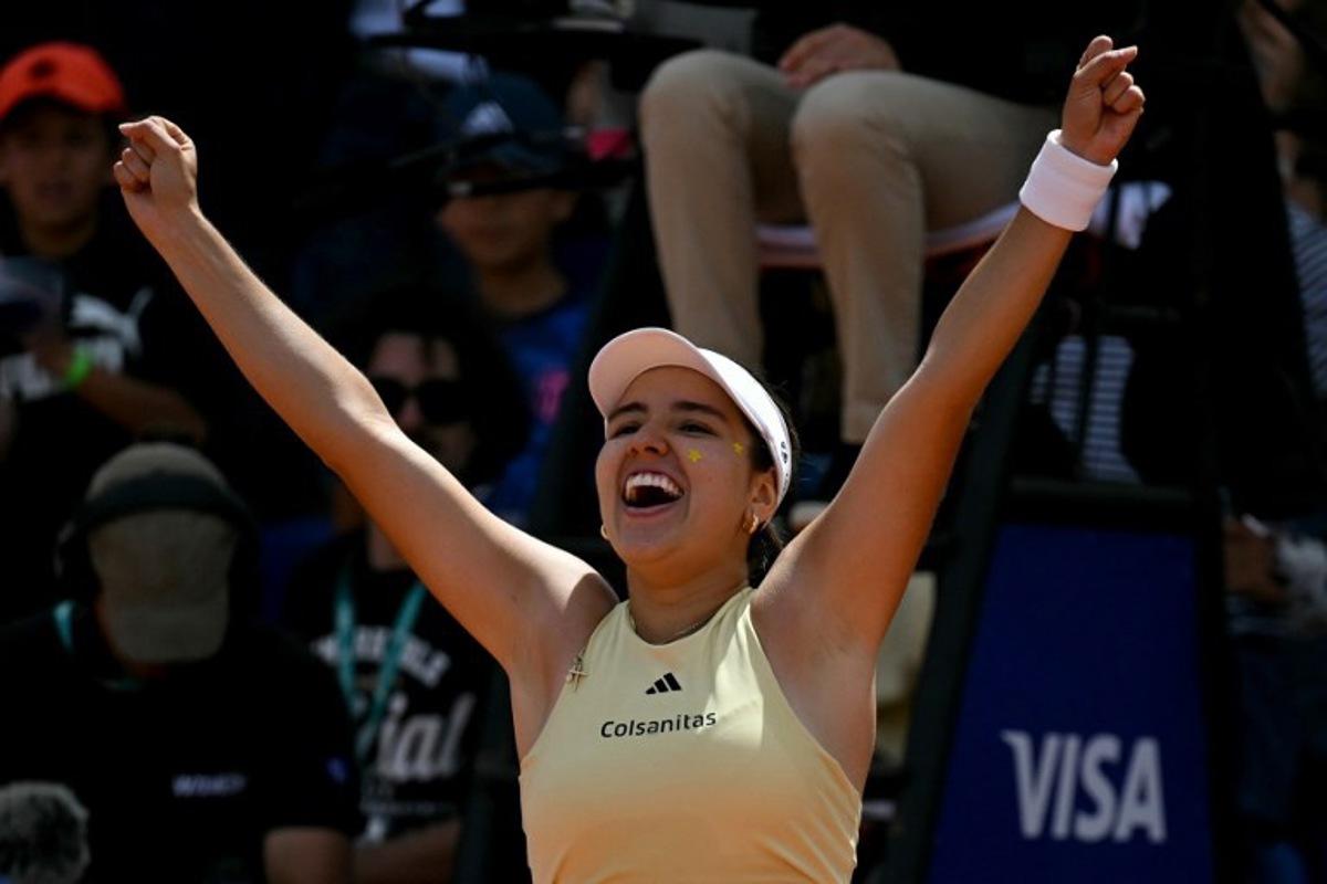 Colombia's Camila Osorio celebrates winning the WTA Bogota 2025 women's singles final match against Poland's Katarzyna Kawa in Bogota on April 6, 2025. Luis ACOSTA / AFP
