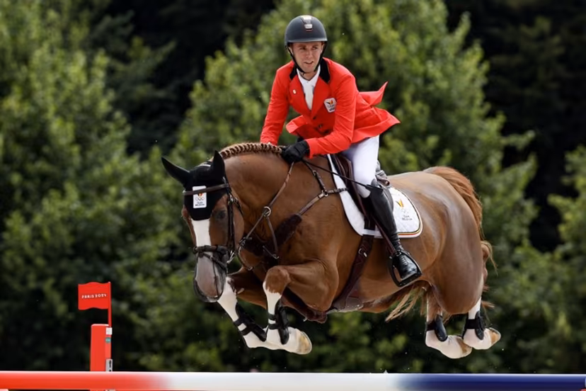 Belgium's Gilles Thomas with horse Ermitage Kalone competes in the equestrian's jumping team final during the Paris 2024 Olympic Games at the Chateau de Versailles, in Versailles, in the western outskirts of Paris, on August 2, 2024. Pierre-Philippe MARCOU / AFP