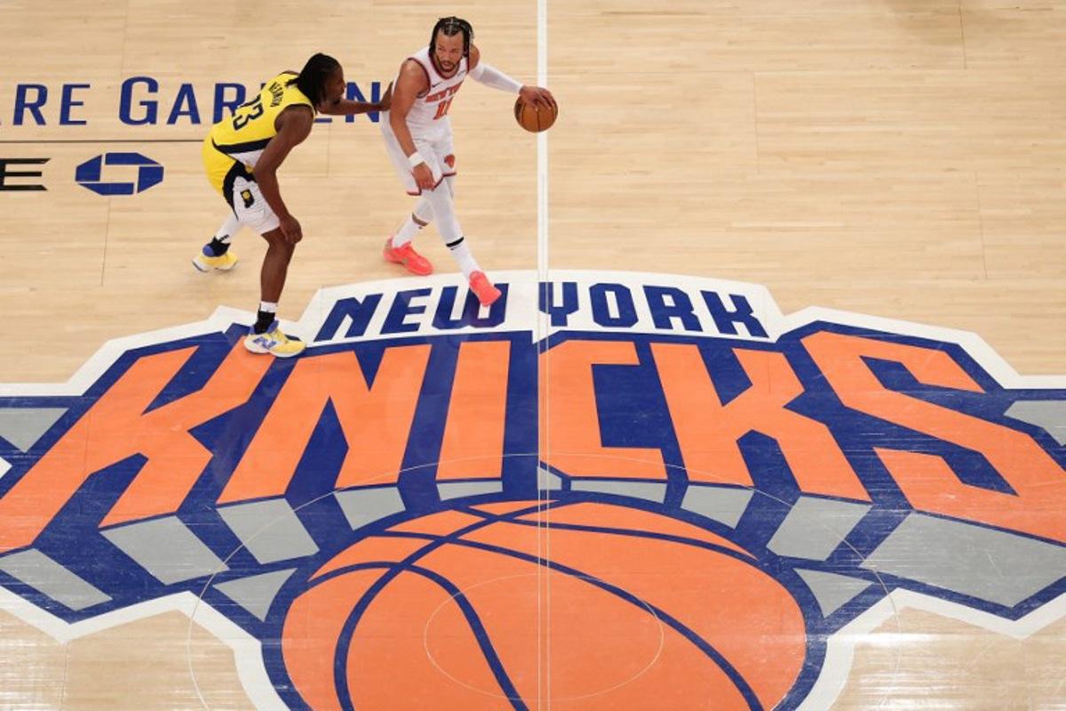 The Knicks' point guard #11 Jalen Brunson dribbles the ball under pressure from the Pacers' small forward #23 Aaron Nesmith during Game Five of the Eastern Conference Finals of the 2025 NBA Playoffs between the New York Knicks and the Indiana Pacers at Madison Square Garden in New York on May 29, 2025. CHARLY TRIBALLEAU / AFP