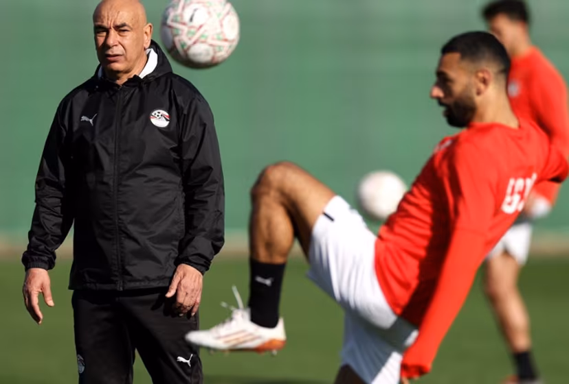 Egypt's head coach Hossam Hassan (L) and Egypt's forward #10 Mohamed Salah attend a training session at the Stadium in Taghzout, Morocco, on December 25, 2025, on the eve of the 2025 Africa Cup of Nations (CAN) football match between Egypt and South Africa. FRANCK FIFE / AFP