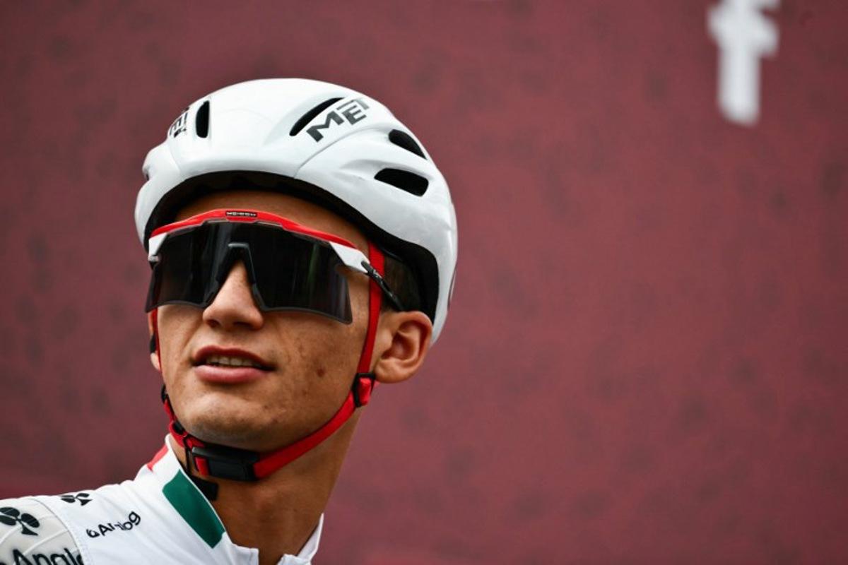 UAE Team Emirates's Mexican Isaac Del Toro Romero looks on ahead of the 20th one-day classic 'Strade Bianche' (White Roads) men's cycling race between Siena and Siena in Tuscany on March 7, 2026. Marco BERTORELLO / AFP