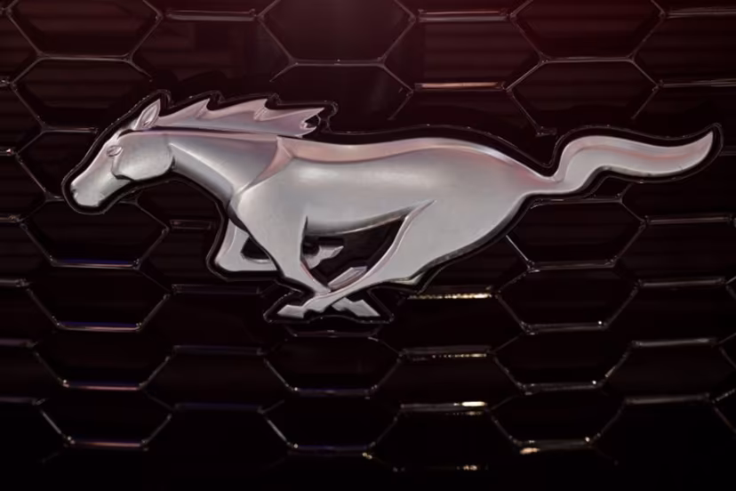 A Ford Mustang logo on is seen during the 21st Shanghai International Automobile Industry Exhibition at the National Exhibition and Convention Center in Shanghai on April 24, 2025. Hector RETAMAL / AFP