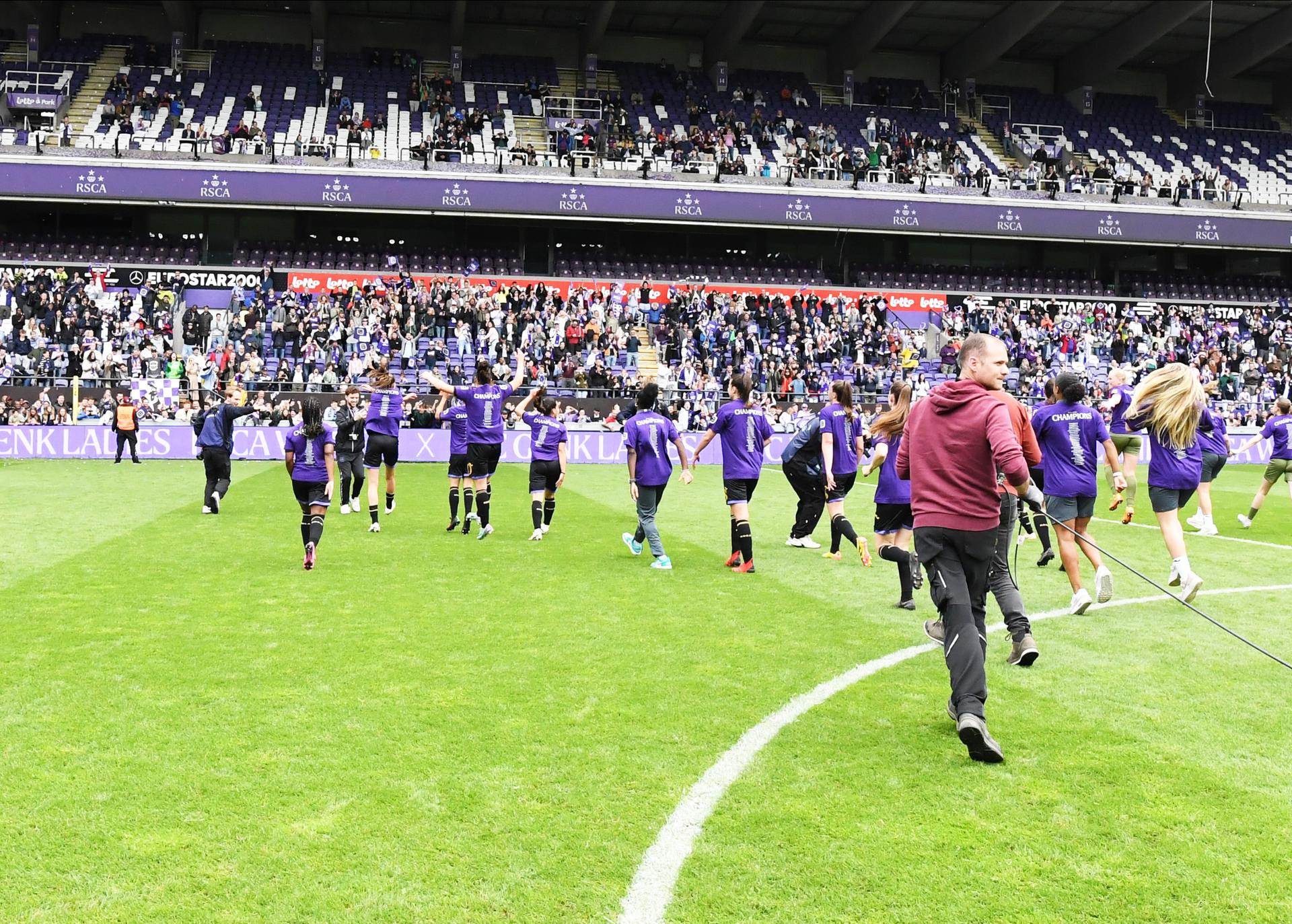 RSCA's players celebrate after winning the Super League women's championship, after a soccer game between RSCA Women and KRC Genk, Saturday 25 May 2024 in Brussels, on day 10/10 of the play-off group A of the Super League women's championship. BELGA PHOTO JILL DELSAUX
