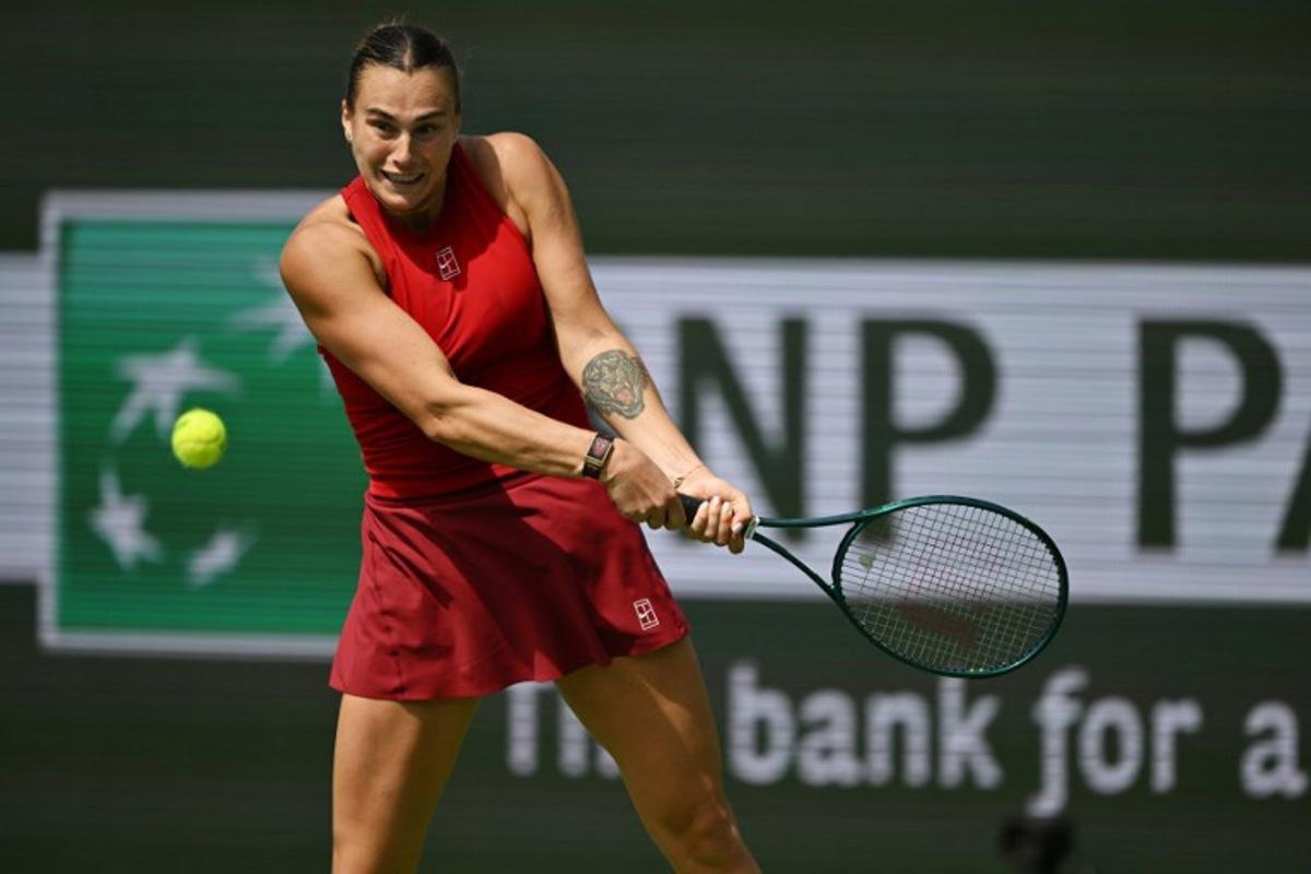 Belarus' Aryna Sabalenka returns the ball to Russia's Mirra Andreeva during the women's singles final tennis match at the BNP Paribas Open at the Indian Wells Tennis Garden in Indian Wells, California, on March 16, 2025. Patrick T. Fallon / AFP