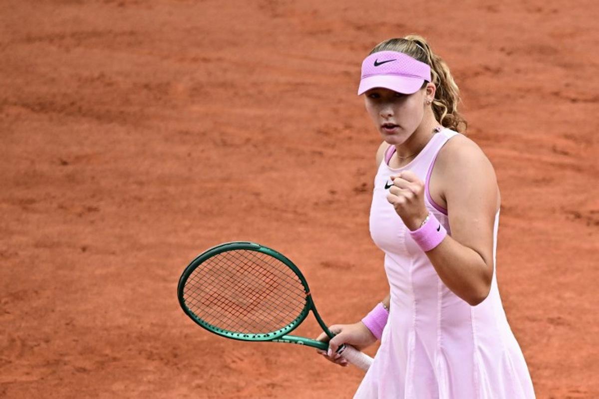 Mirra Andreeva reacts after a point as she plays against Ukraine's Marta Kostyuk during their women's semi final singles match on day 12 of the French Open tennis tournament on Court Philippe-Chatrier at the Roland-Garros Complex in Paris on June 4, 2026. JULIEN DE ROSA / AFP