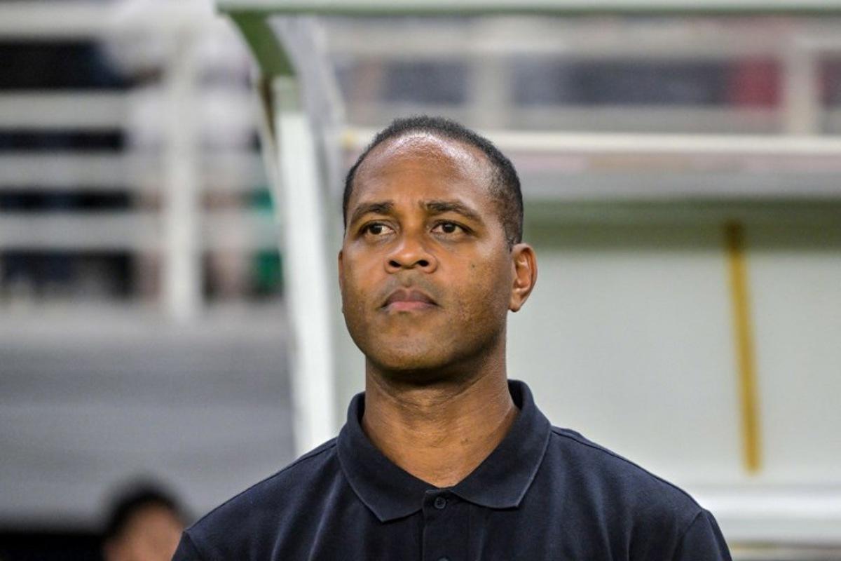 Indonesia's Dutch head coach Patrick Kluivert listens to the national anthem prior to the international friendly football match on FIFA Matchday between Indonesia and Taiwan at Gelora Bung Tomo Stadium in Surabaya on September 5, 2025. Juni KRISWANTO / AFP