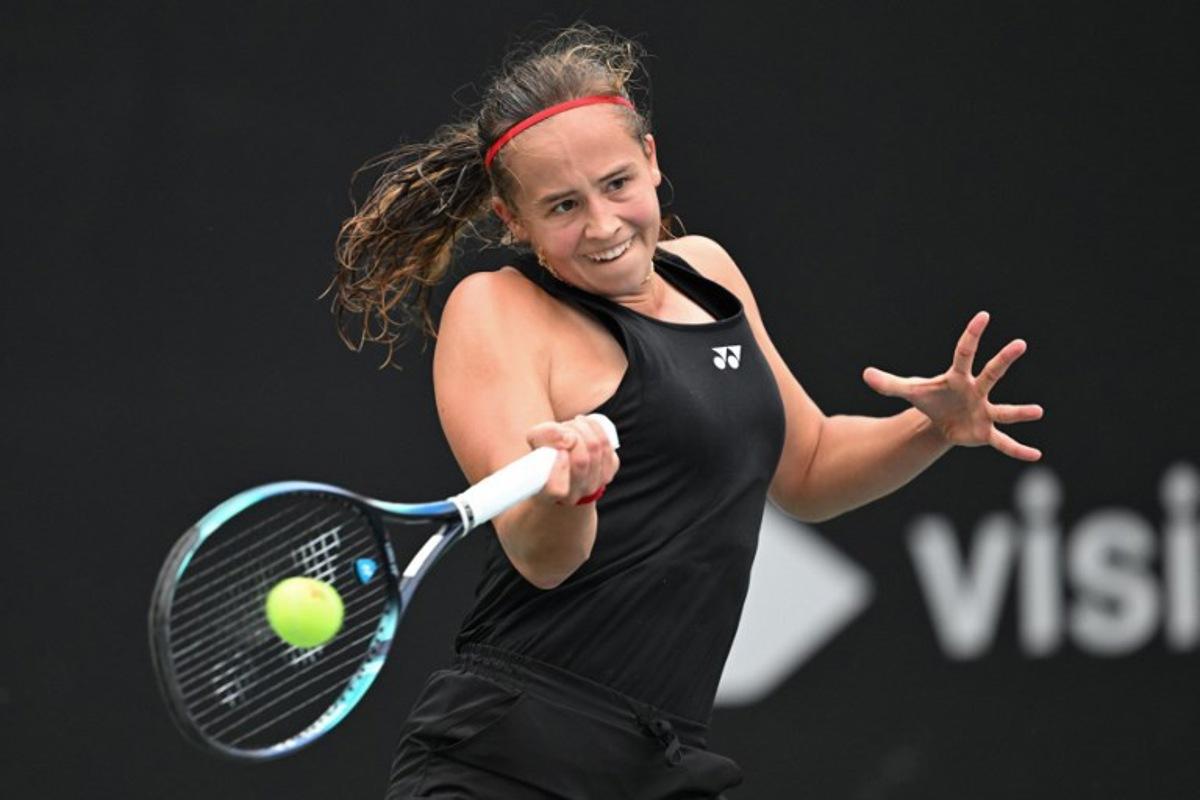 Belgium's Hanne Vandewinkel hits a return to China's Wei Sijia during their women's singles match at the Billie Jean King Cup tennis play-offs at the Guangzhou Nansha International Tennis Center in Guangzhou, in south China's Guangdong province on November 17, 2024. STR / AFP