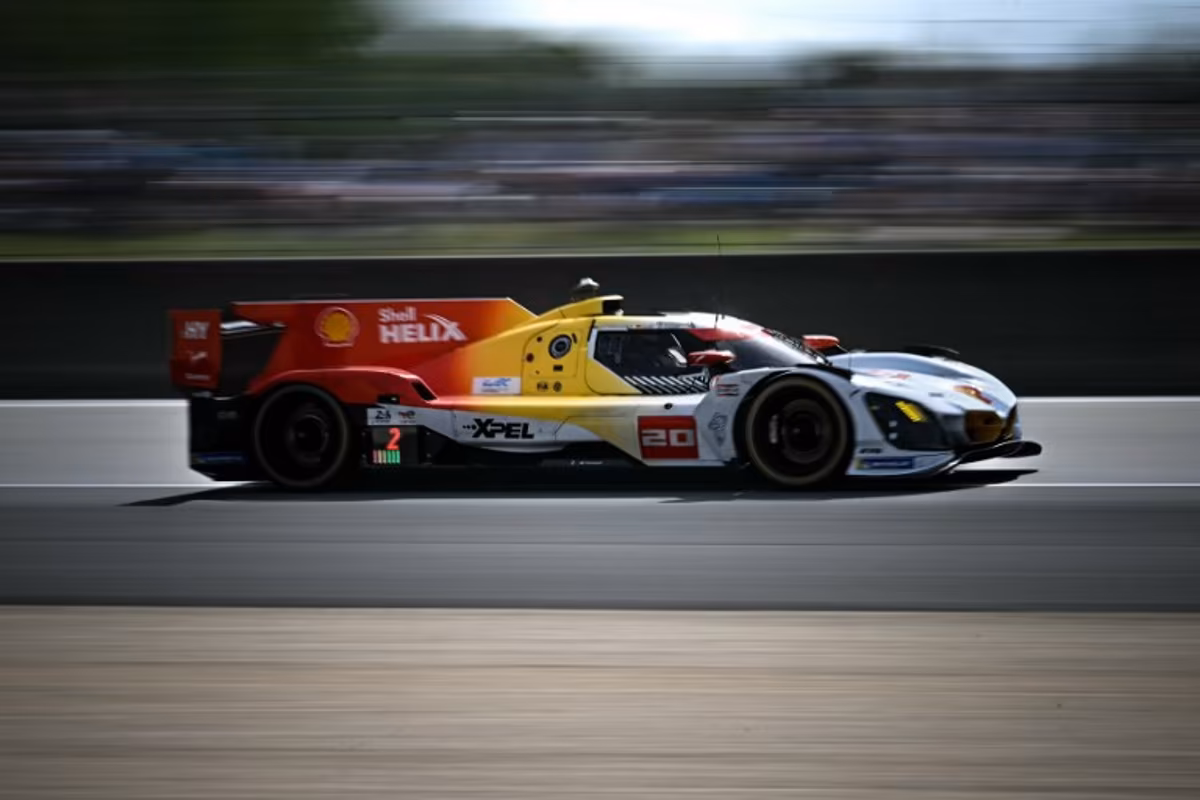 This photograph shows BMW M Team WRT's hypercar driven by Dutch Robin Frijns, German René Rast and South African Sheldon van der Linde during the 94th edition of the 24 Hours of Le Mans at the Le Mans circuit, north-western France on June 13, 2026. Lou BENOIST / AFP