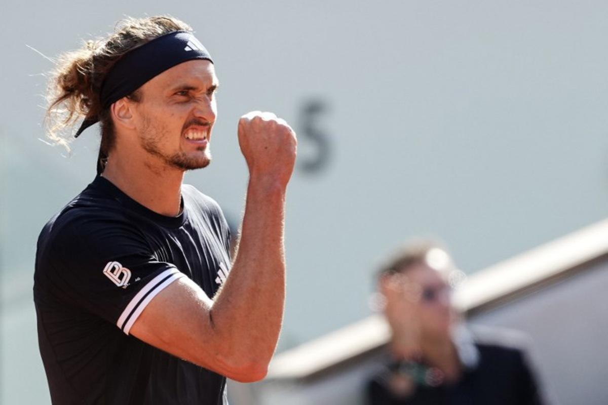 Germany's Alexander Zverev reacts as he wins the third set during his mens final singles match against Italy's Flavio Cobolli on day 15 of the French Open tennis tournament on Court Philippe-Chatrier at the Roland-Garros Complex in Paris on June 7, 2026. Dimitar DILKOFF / AFP
