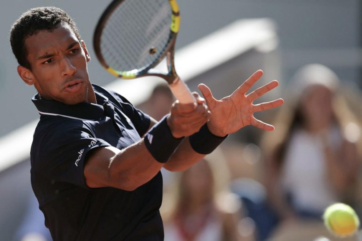 Canada's Felix Auger-Aliassime plays a forehand return to Chile's Alejandro Tabilo during their men's singles match on day 9 of the French Open tennis tournament on Court Philippe-Chatrier at the Roland-Garros Complex in Paris on June 1, 2026. Thomas SAMSON / AFP