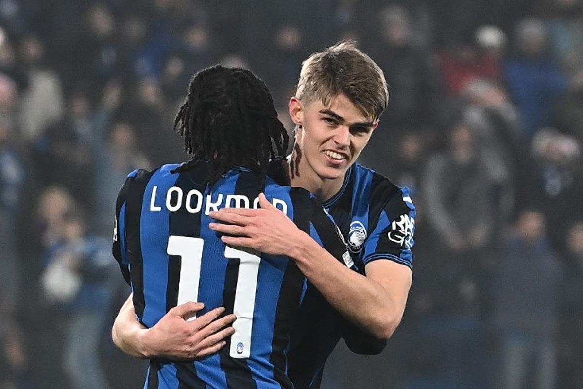 Atalanta's Nigerian forward #11 Ademola Lookman celebrates with Atalanta's Belgian midfielder #17 Charles De Ketelaere after scoring his team's fourth goal during the UEFA Champions League football match between Atalanta and Sturm Graz at the Gewiss Stadium in Bergamo, on January 21, 2025. Isabella BONOTTO / AFP