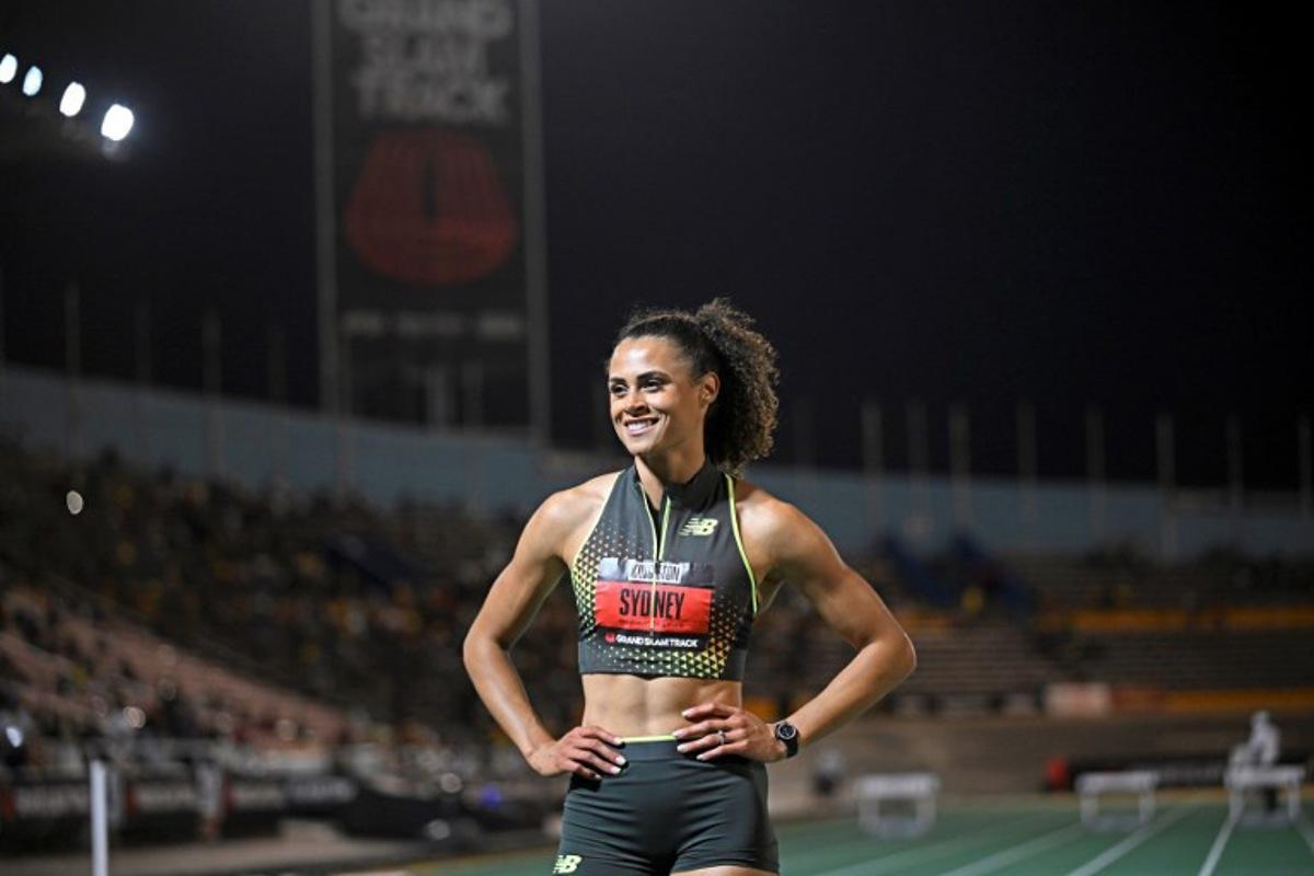 USA's Sydney McLaughlin-Levrone of team New Balance celebrates winning the women's 400 meter long hurdles during the Grand Slam Track competition at the National Stadium in Kingston, Jamaica on April 4, 2025. Ricardo Makyn / AFP