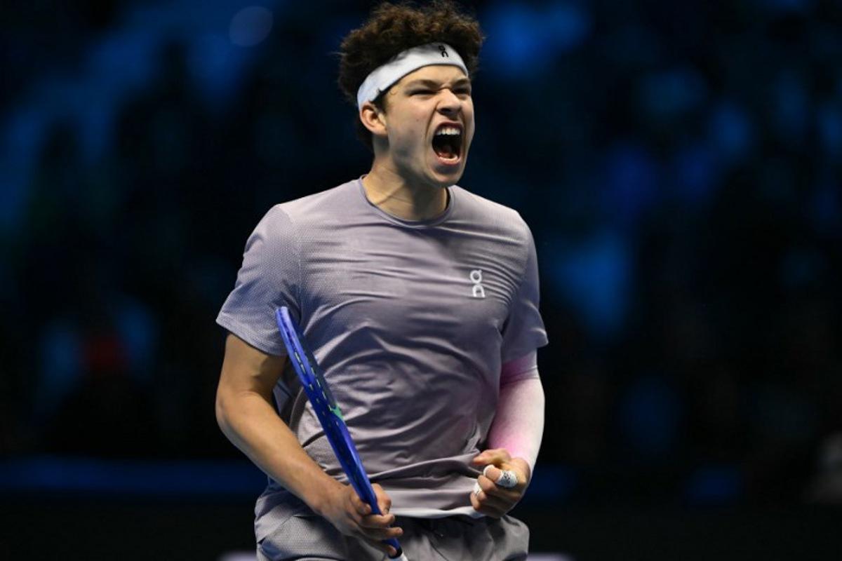 USA's Ben Shelton reacts during his match against Canada's Felix Auger-Aliassime at the ATP Finals tennis tournament in Turin on November 12, 2025. Marco BERTORELLO / AFP