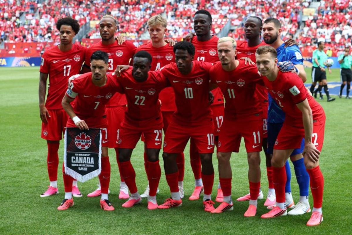 Canada's players pose ahead of the 2026 World Cup Group B football match between Canada and Bosnia and Herzegovina at the Toronto Stadium in Toronto on June 12, 2026. Cole Burston / AFP