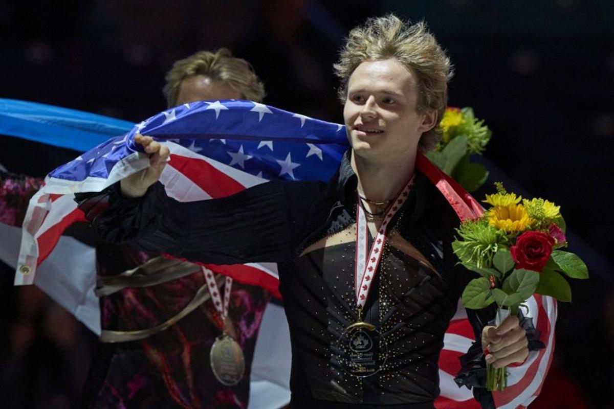 Gold medalist Ilia Malinin of the United States celebrates after winning the free program in the men's competition during the ISU Grand Prix of Figure Skating 2025 Skate Canada International at the SaskTel Centre in Saskatoon, Saskatchewan, Canada on November 2, 2025. Geoff Robins / AFP