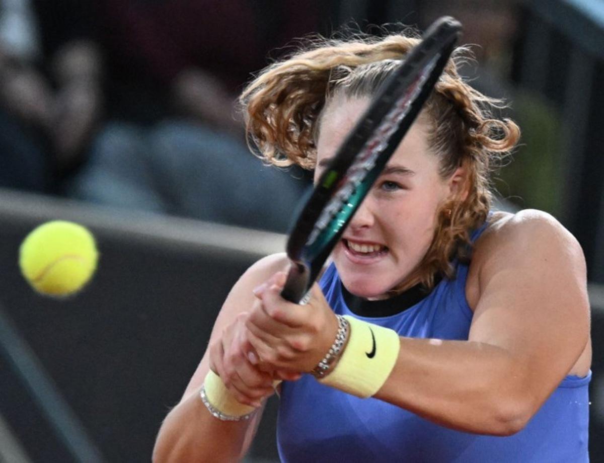 Russia's Mirra Andreeva returns the ball to Romania's Elena-Gabriela Ruse during their women's semi-final match of the WTA Upper Austria Women's Linz tennis tournament in Linz, Austria on April 11, 2026. BARBARA GINDL / APA / AFP