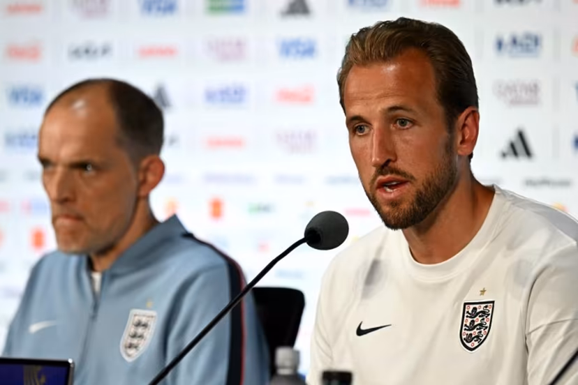 England's forward #09 Harry Kane (R) gives an MD-1 press conference next to German head coach Thomas Tuchel (L) at the Dallas Stadium in Arlington on June 16, 2026, on the eve of the 2026 World Cup Group L football match between England and Croatia. Paul ELLIS / AFP