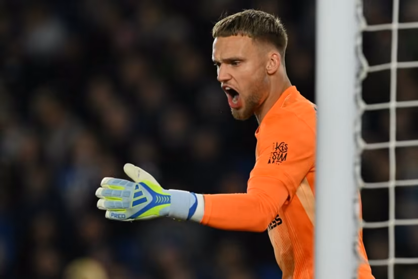 Brighton's Dutch goalkeeper #01 Bart Verbruggen shouts instructions during the English Premier League football match between Brighton and Hove Albion and Chelsea at the American Express Community Stadium in Brighton, southern England on April 21, 2026. Glyn KIRK / AFP
