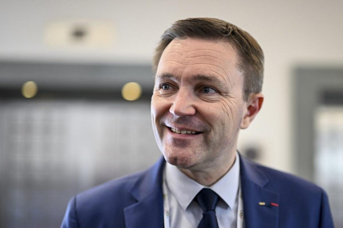 Candidate to the presidency of the International Olympic Committee (IOC) David Lappartient of France speaks to the presse during the 144th IOC Session in Costa Navarino, Greece, where the next IOC President will be elected, on March 19, 2025. The election between seven canditates will take place on March 20, 2025. Fabrice COFFRINI / AFP