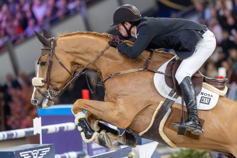 Rider Jos Verlooy and horse Renshaw van't Meulenhof are pictured during the FEI World Cup Jumping competition at the "Vlaanderens Kerstjumping" equestrian event in Mechelen on Tuesday 30 December 2025. BELGA PHOTO JONAS ROOSENS