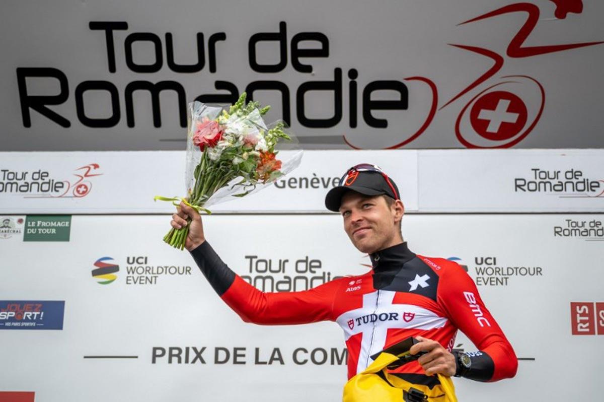 Danish rider Alexander Kamp poses on the podium with the combativity prize after the final stage of the Tour of Romandie UCI cycling World tour, 170.8 km from Vufflens-la-Ville to Geneva, on April 30, 2023. Fabrice COFFRINI / AFP