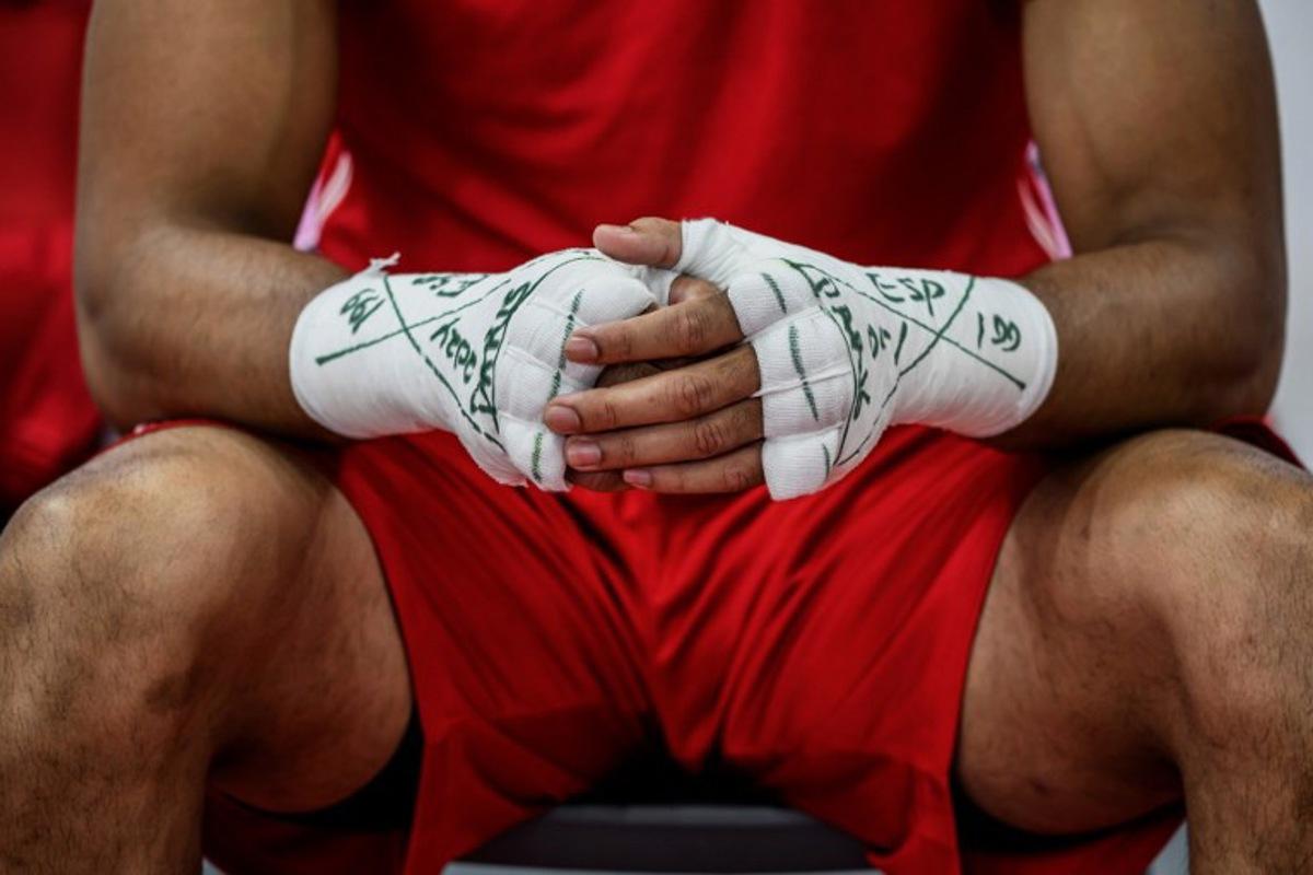 Spain's Enmanuel Reyes Pla prepares before competing against Azerbaijan's Loren Berto Alfonso Dominguez (Blue) in the men's 92kg semi-final boxing match during the Paris 2024 Olympic Games at the North Paris Arena, in Villepinte on August 4, 2024. JEFF PACHOUD / AFP