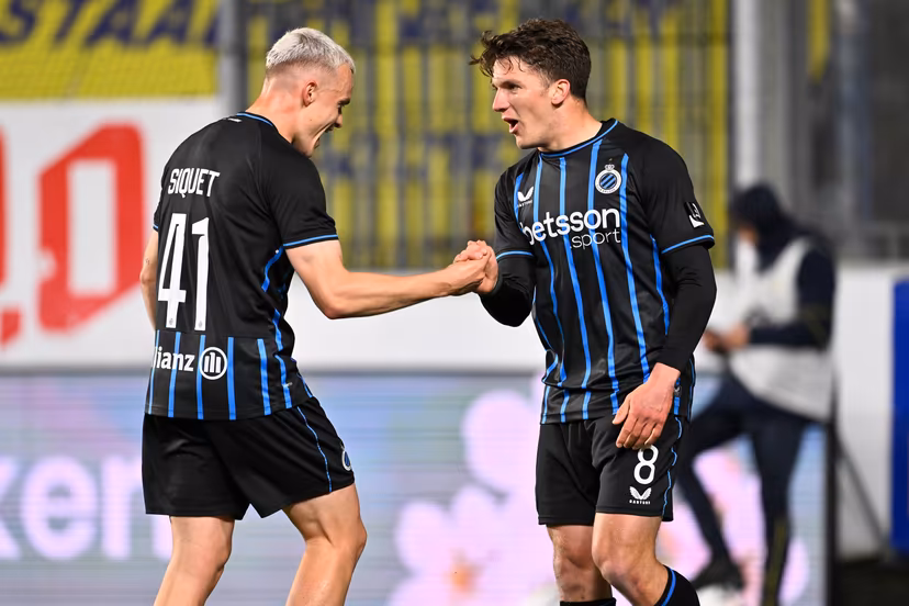 Club's Hugo Siquet and Club's Christos Tzolis celebrate after scoring during a soccer match between Sint-Truiden VV and Club Brugge, Saturday 11 April 2026 in Sint-Truiden, on the second day of the Champion's Play-offs of the 2025-2026 'Jupiler Pro League' first division of the Belgian championship. BELGA PHOTO JOHAN EYCKENS