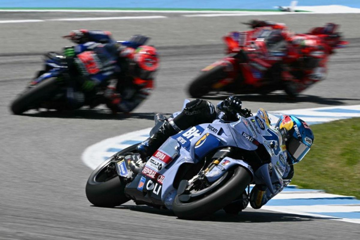 Gresini Racing MotoGP's Spanish rider Alex Marquez rides ahead of Monster Energy Yamaha MotoGP's French rider Fabio Quartararo and Ducati Lenovo Team's Italian rider Francesco Bagnaia during the MotoGP Spanish Grand Prix at the Jerez racetrack in Jerez de la Frontera, on April 27, 2025. JAVIER SORIANO / AFP