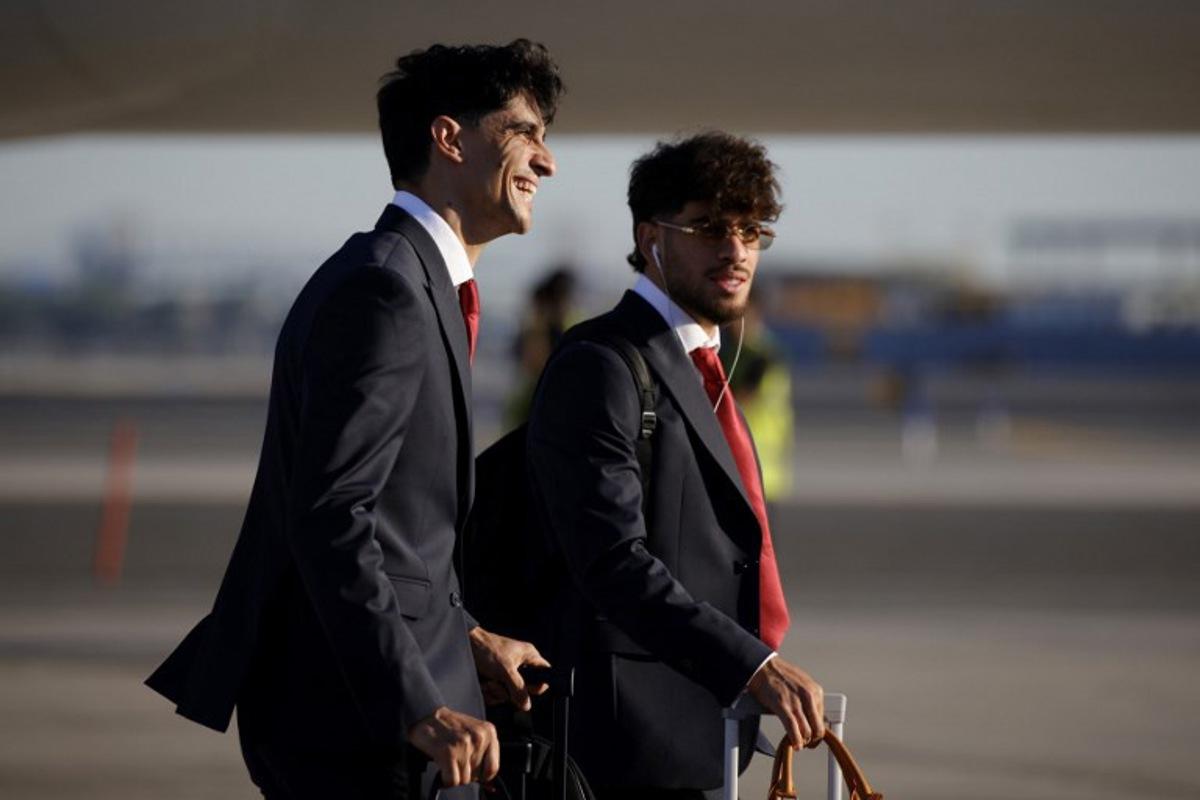 Morocco's goalkeeper Yassine Bounou (L) and forward Abde Ezzalzouli (R), arrive with team Morocco at Newark Liberty International Airport (EWR) in Newark, New Jersey, on June 3, 2026 ahead of the FIFA World Cup. Leonardo MUNOZ / AFP