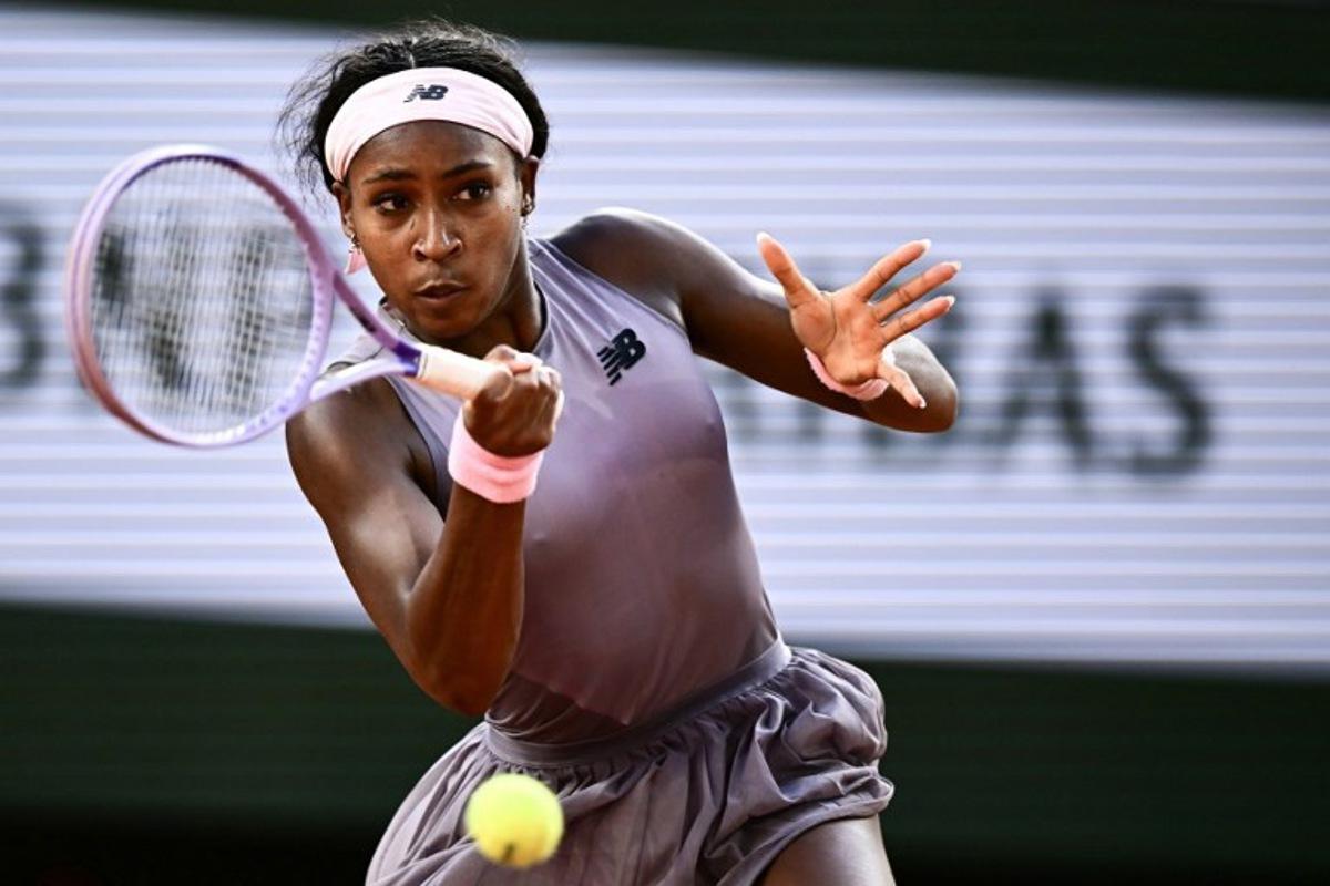 US Coco Gauff plays a forehand return to Austria's Anastasia Potapova during their women's singles match on day 7 of the French Open tennis tournament on Court Philippe-Chatrier at the Roland-Garros Complex in Paris on May 30, 2026. JULIEN DE ROSA / AFP